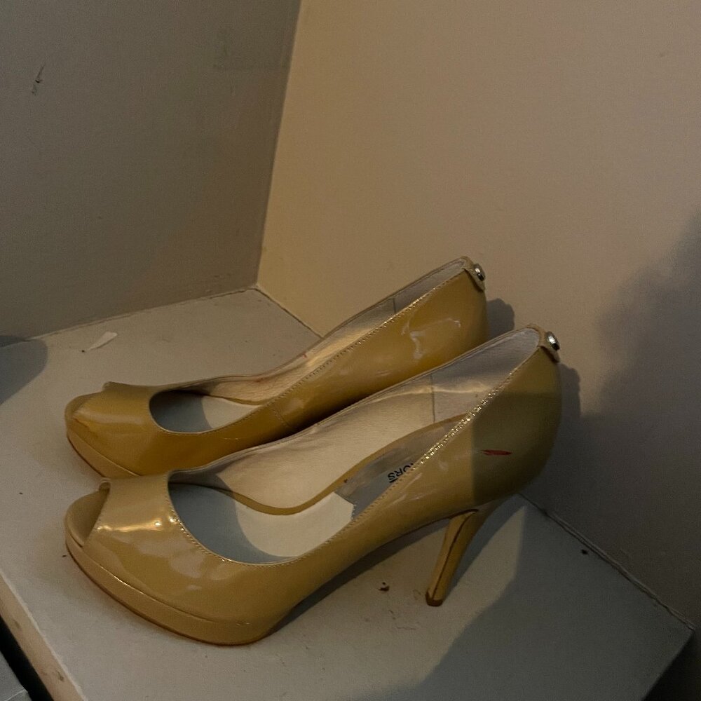 Michael Kors tan patton leather platform peep toe pumps